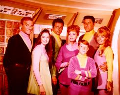 Lost in Space cast wearing spacesuits